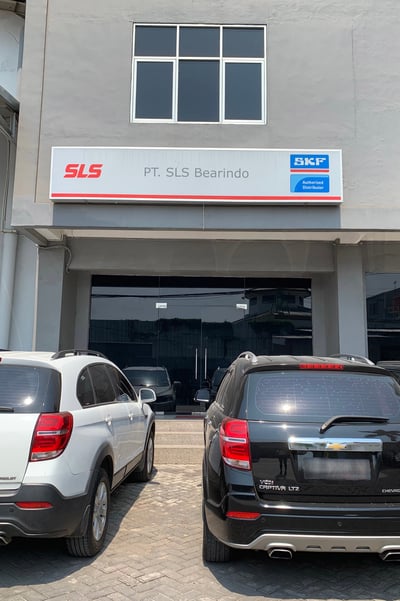 Image shows the shopfront of SLS Jakarta office featuring the PT. SLS Bearindo signboard
