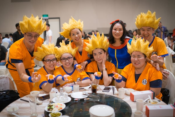 Image shows a group of people dressed as Dragonball characters posing for the camera