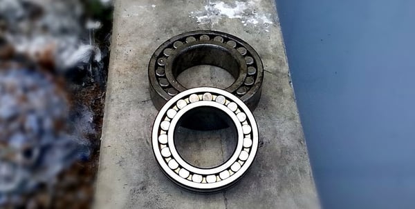 Image shows two bearings on a flat surface