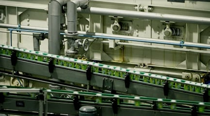 Image shows the parallel view of the coca-cola conveyor system