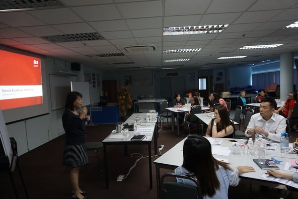 Image shows the introduction of service excellence workshop by HR Manager, Ms Kris Ong