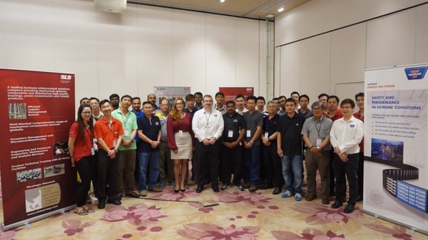 Image shows the group photo of SLS and Optibelt staff inside a hall